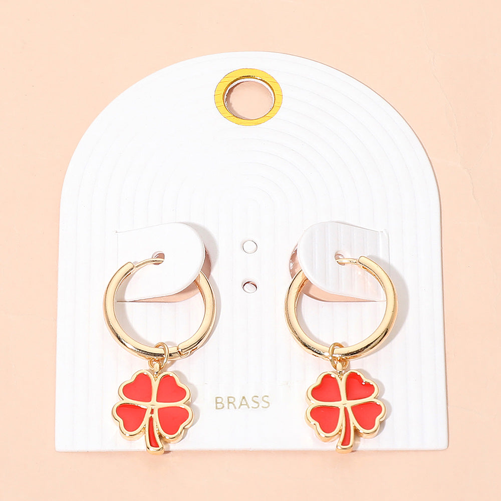 Madeline Love Gold, Red Clover Charm Drop Mini Huggie Hoop Earrings