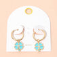 Madeline Love Gold, Turquoise Clover Charm Drop Mini Huggie Hoop Earrings