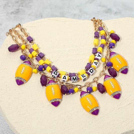Madeline Love Gold, Purple , Yellow Football Charm Embellished GAME DAY Heishi Beaded Layered Necklace - Necklaces