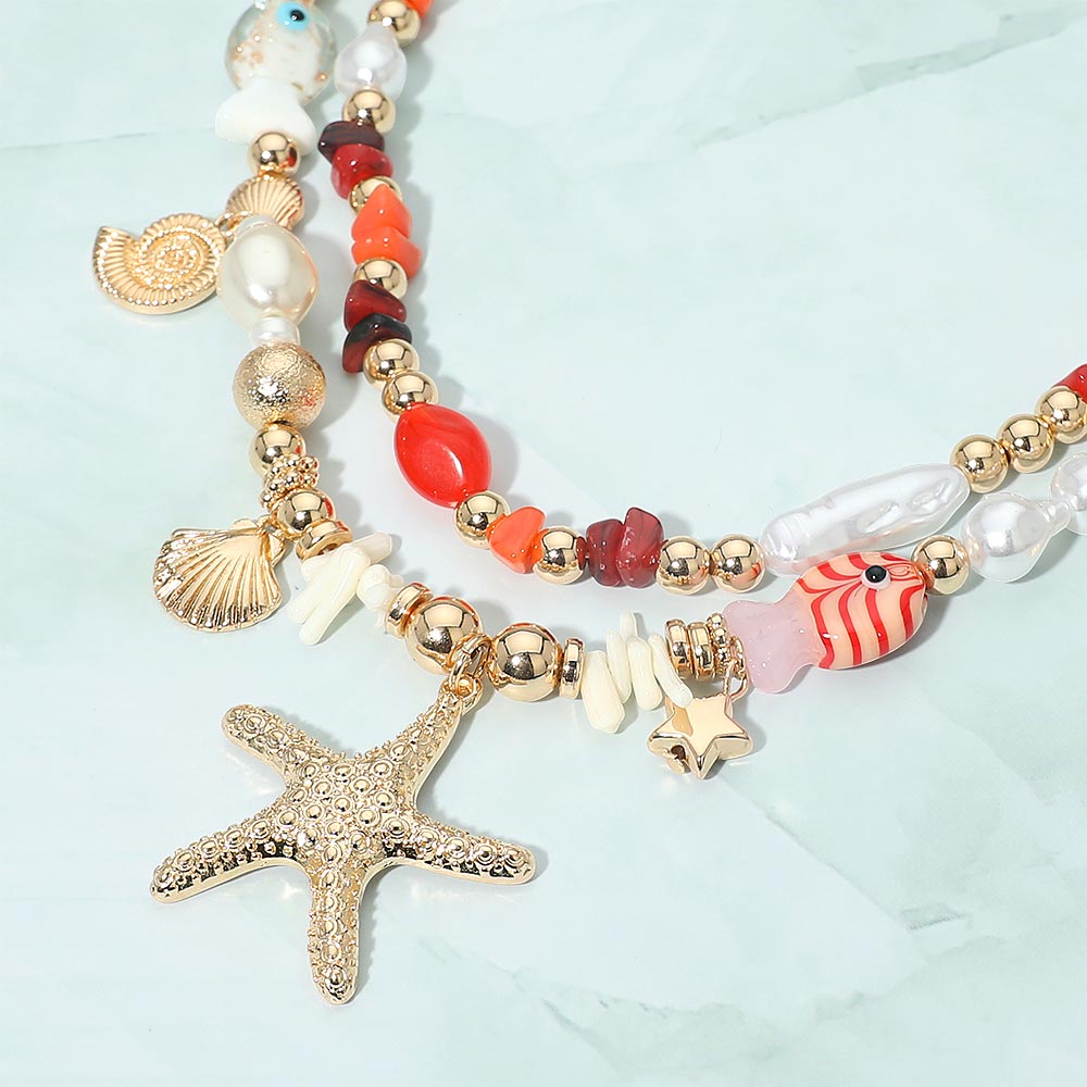 Madeline Love Coral, Gold Coastal Charm Pearl Pebble Beaded Layered Strand Statement Necklace - Necklaces