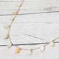 Madeline Love White Marbled Resin Beads Drop Station Necklace - Necklaces