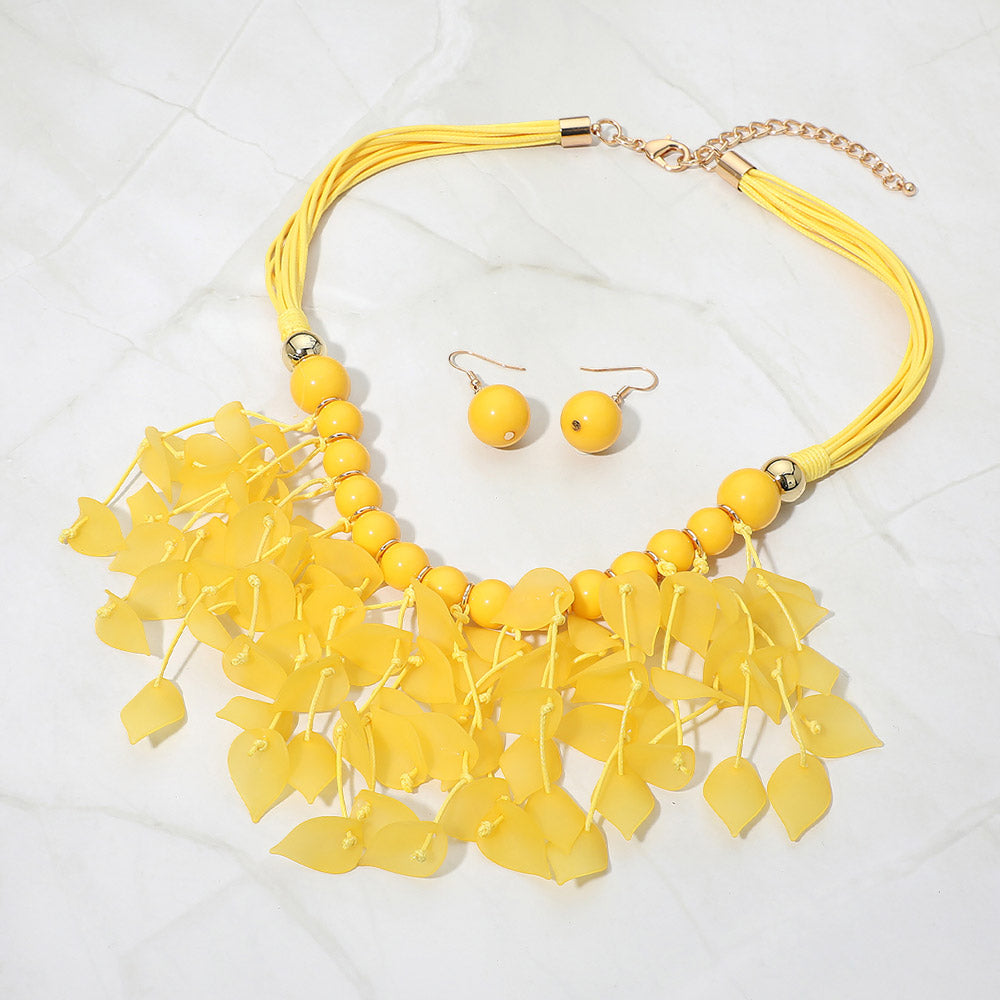 Madeline Love Gold, Yellow Bold Leaf Fringe Embellished Multi Cord Statement Necklace - Necklaces