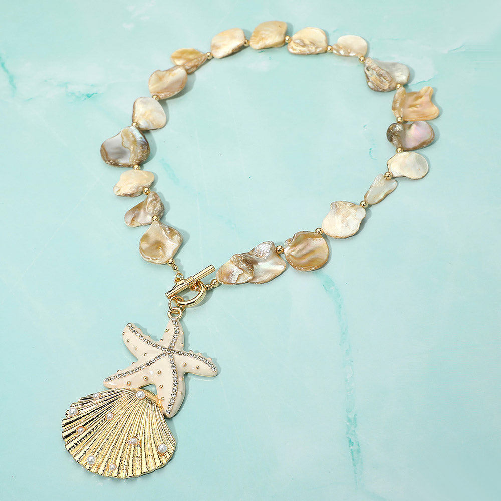 Madeline Love Ivory Rhinestone Embellished Starfish Pearl Seashell Pendant Shell Beaded Statement Necklace - Necklaces