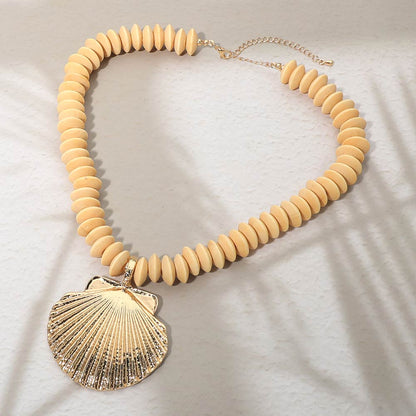 Madeline Love Gold, Ivory Seashell Accent Wooden Beaded Statement Necklace - Necklaces