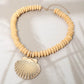 Madeline Love Ivory, Worn Gold Seashell Accent Wooden Beaded Statement Necklace - Necklaces - desc
