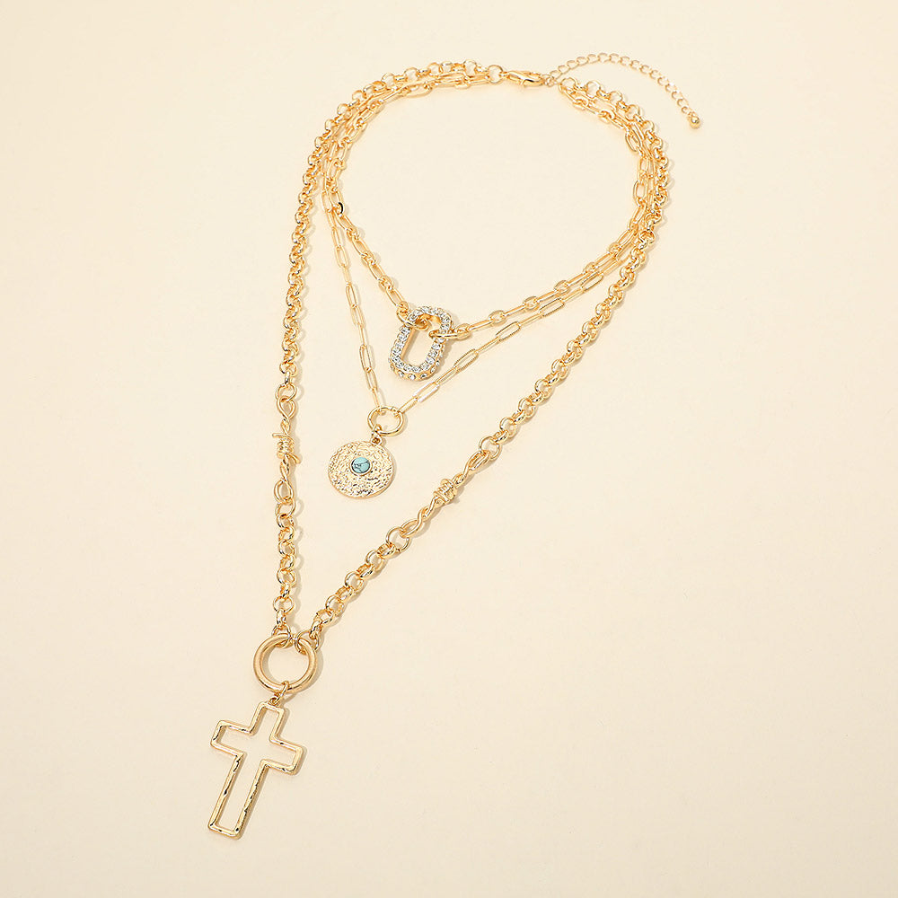 Madeline Love Worn Gold Cross Stone Center Disc Rhinestone Pave Open Oval Pendant Accent Layered Statement Necklace