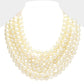 cream chunky acrylic beaded multi-strand necklace with magnetic clasp