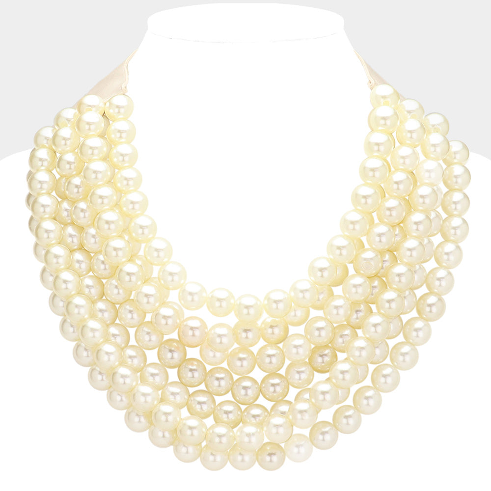 cream chunky acrylic beaded multi-strand necklace with magnetic clasp
