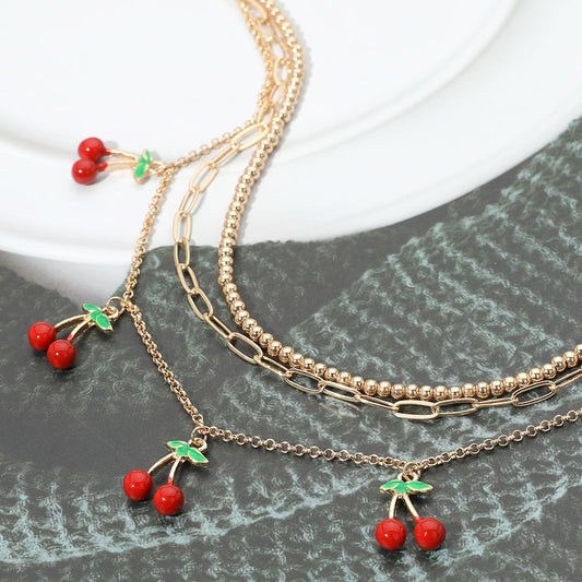Madeline Love Gold Enamel Cherry Charm Station Layered Necklace - Necklaces