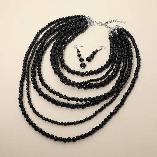 Madeline Love Black Multi Strand Beaded Statement Necklace - Necklaces