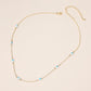 Madeline Love Gold, White Evil Eye Bead Station Chain Necklace - Necklaces - desc