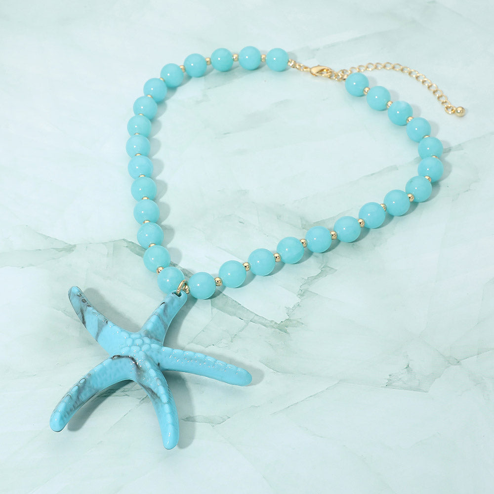 Madeline Love Gold, Turquoise Bold Starfish Pendant Beaded Statement Necklace - Necklaces