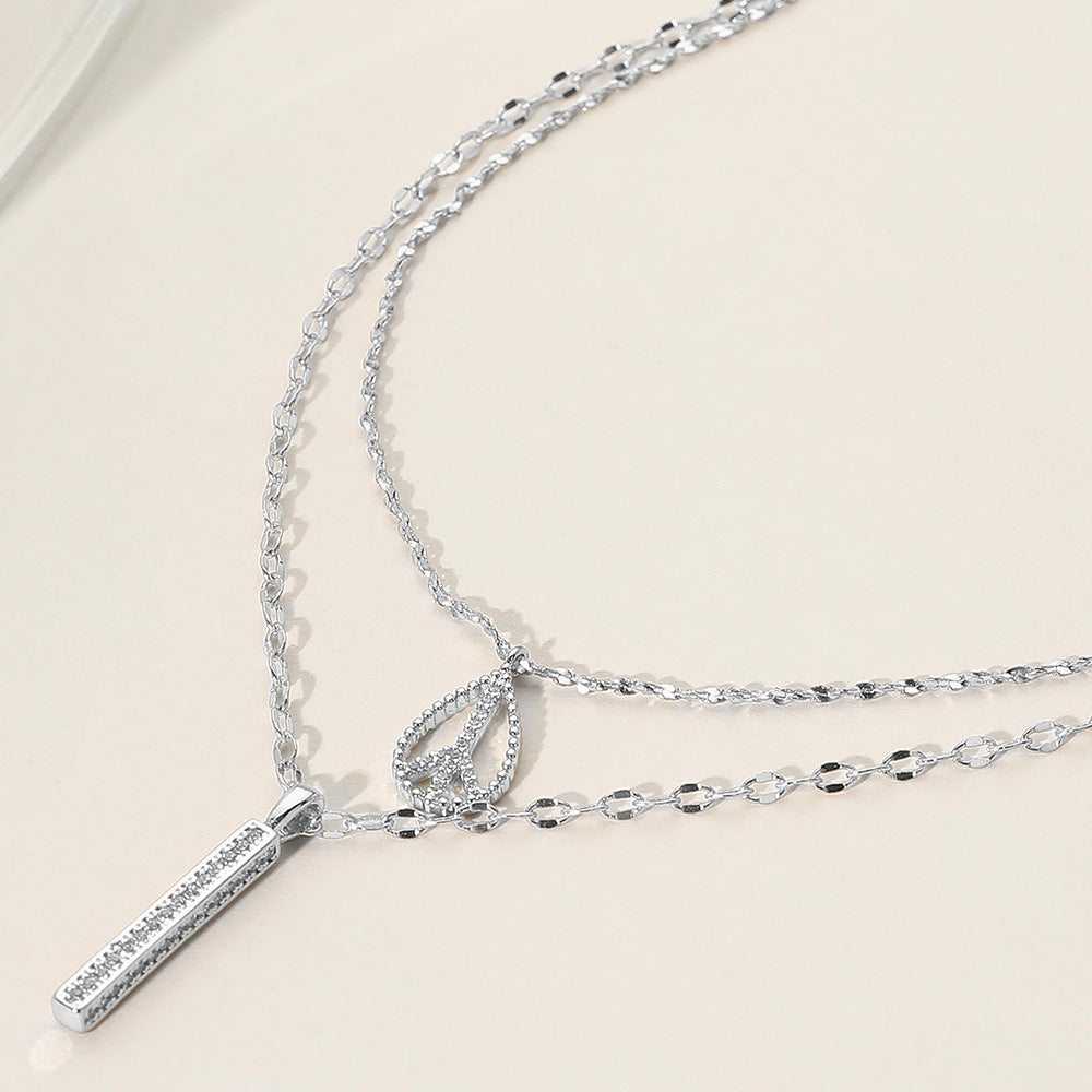 Madeline Love Rhodium Rhinestone Peace Sign Bar Pendant Double Layered Necklace