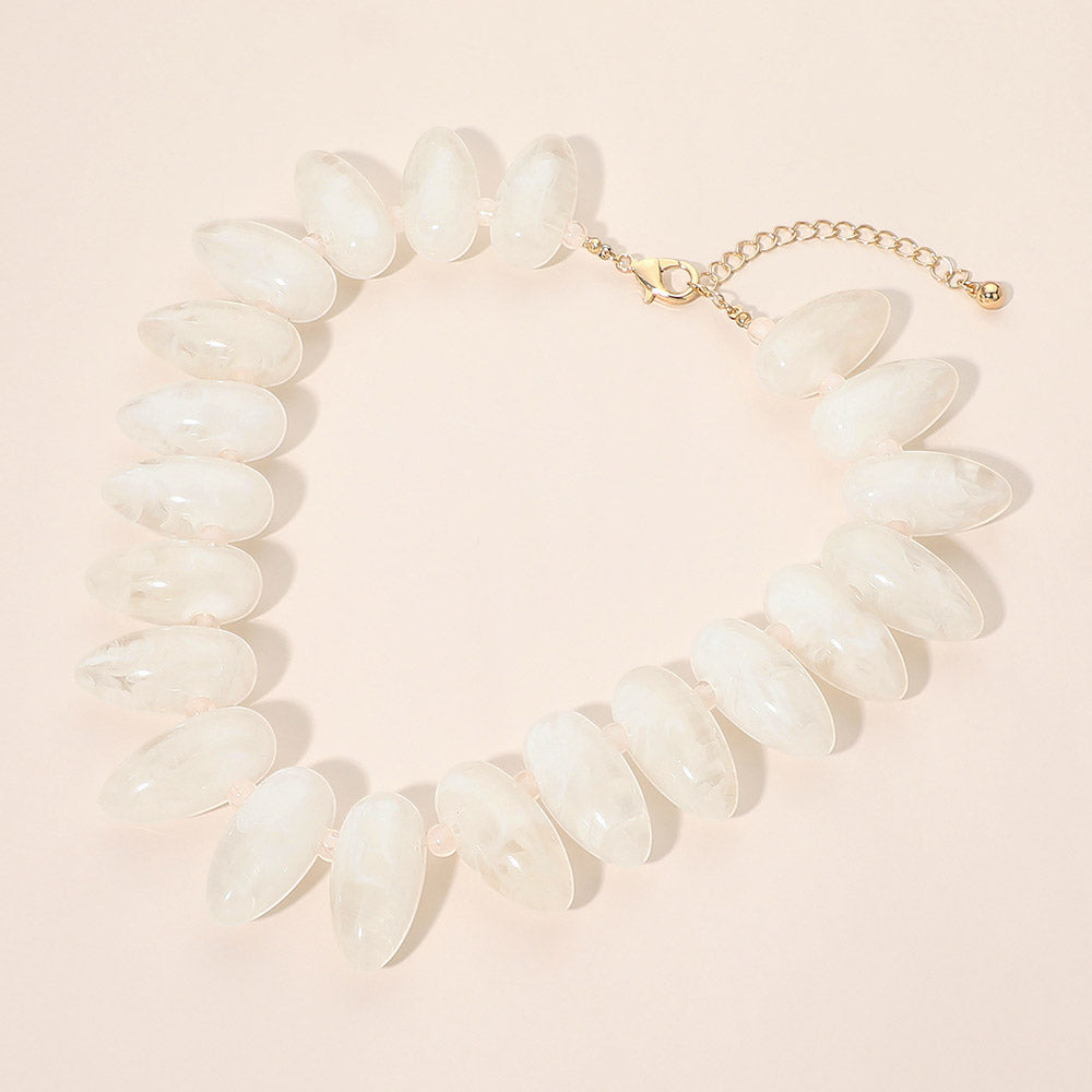 Madeline Love Gold, Ivory Chunky Resin Pebble Beaded Statement Necklace