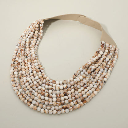 Madeline Love Ivory Marbled Ball Beaded Multi Layered Faux Leather Magnetic Necklace - Necklaces