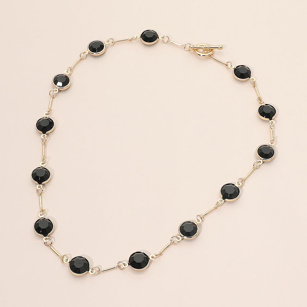 Madeline Love Black, Gold Round Stone Link Toggle Necklace