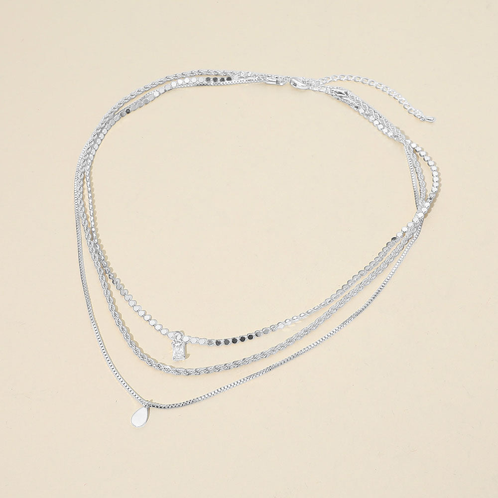 Madeline Love Clear, Silver, White Gold White Gold Dipped Teardrop Stone Bezel Pendant Accent Mixed Chain Layered Necklace - Necklaces - desc