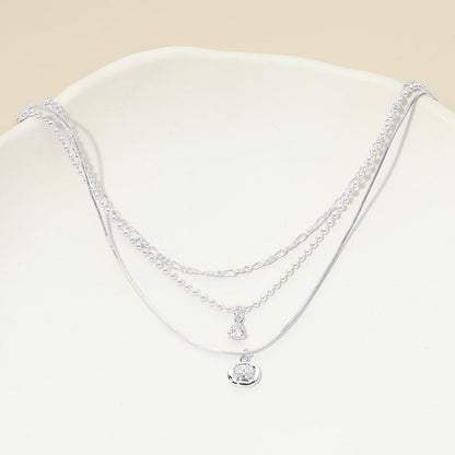 Madeline Love Clear, Silver, White Gold White Gold Dipped Stone Accent Coin Charm Mixed Chain Layered Necklace - Necklaces