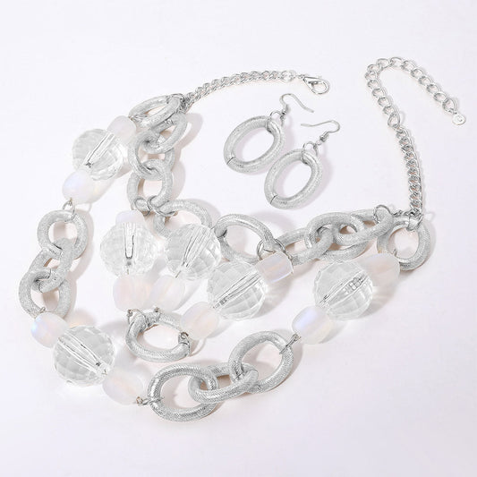 Madeline Love Clear, Rhodium Chunky Acrylic Ball Textured Metal Ring Abstract Chandelier Statement Necklace - Necklaces