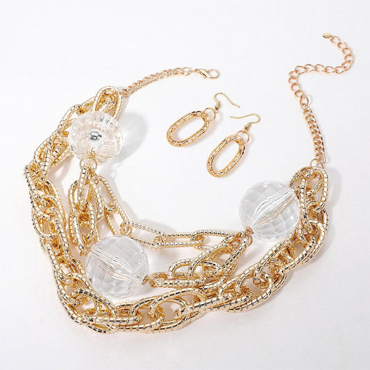 Madeline Love Clear, Gold Chunky Acrylic Ball Textured Chain Layered Statement Necklace - Necklaces