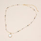 Madeline Love Black, Cream Pearl Coin Pendant Faceted Beaded Chain Necklace - Necklaces - desc
