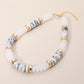 Madeline Love Gold, Howlite Chunky Resin Disc Beaded Necklace - Necklaces