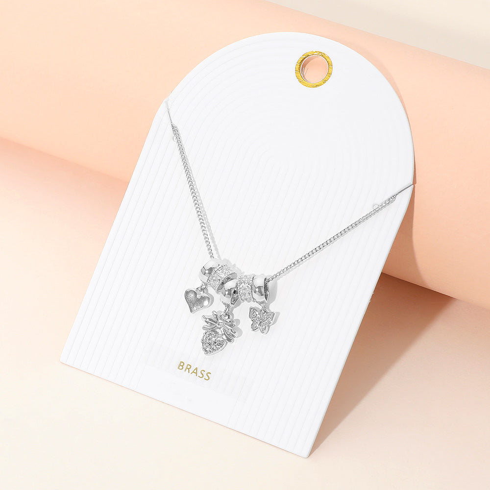 Madeline Love Clear, Silver Stone Paved Heart Butterfly Bow Charm Beaded Necklace - Necklaces