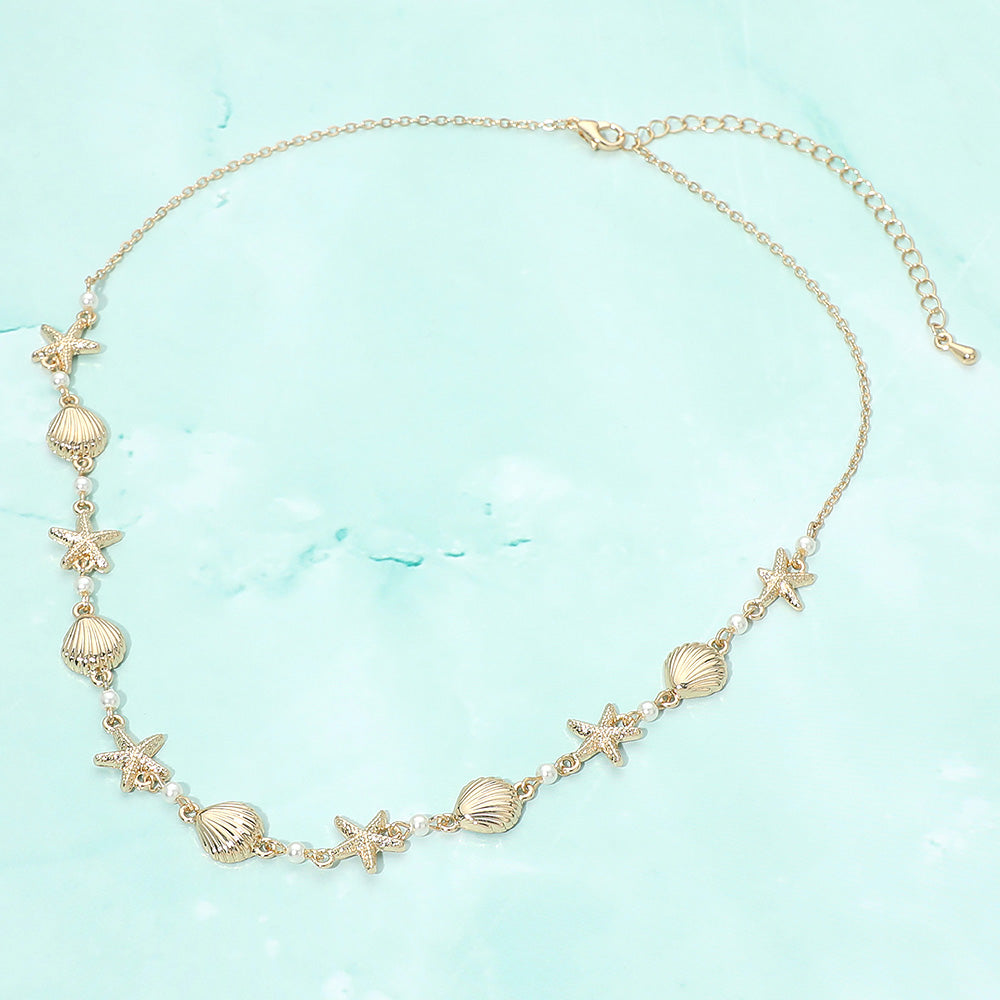 Madeline Love Cream, Gold Textured Seashell Starfish Pearl Link Necklace