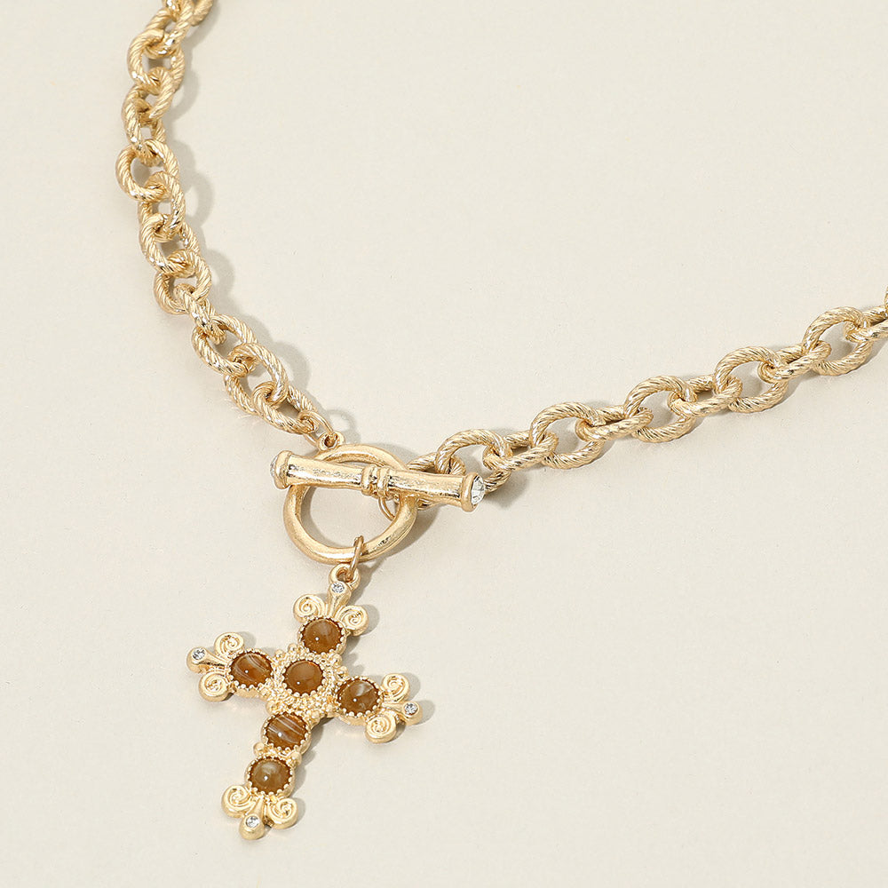 Madeline Love Brown, Worn Gold Stone Ornate Cross Charm Pendant Toggle Necklace