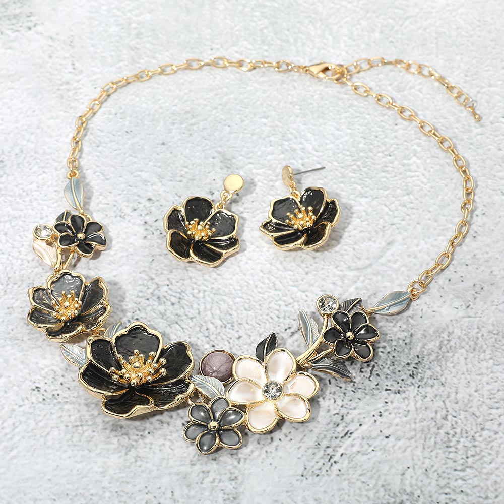 Madeline Love Black, Gold Floral Link Statement Necklace - Necklaces