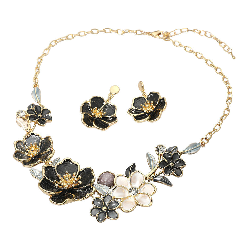 Madeline Love Black, Gold Floral Link Statement Necklace - Necklaces - desc