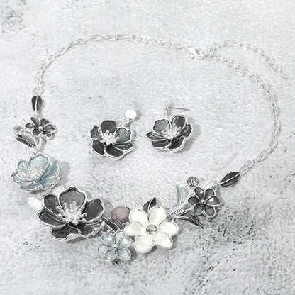 Madeline Love Black, Silver Floral Link Statement Necklace - Necklaces