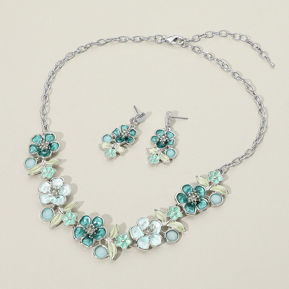 Madeline Love Silver, Teal Floral Link Statement Necklace