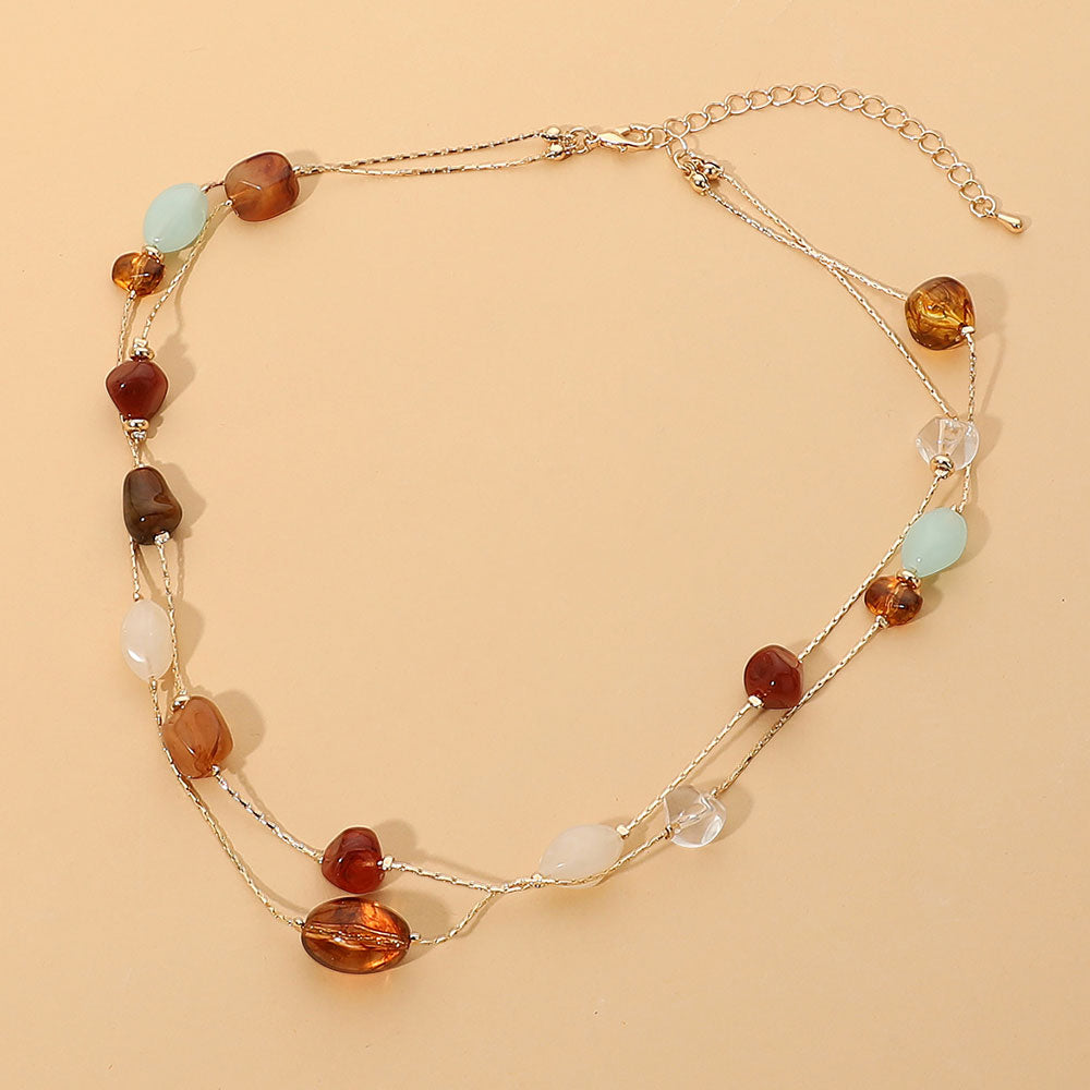 Madeline Love Brown, Gold Double Strand Beaded Necklace