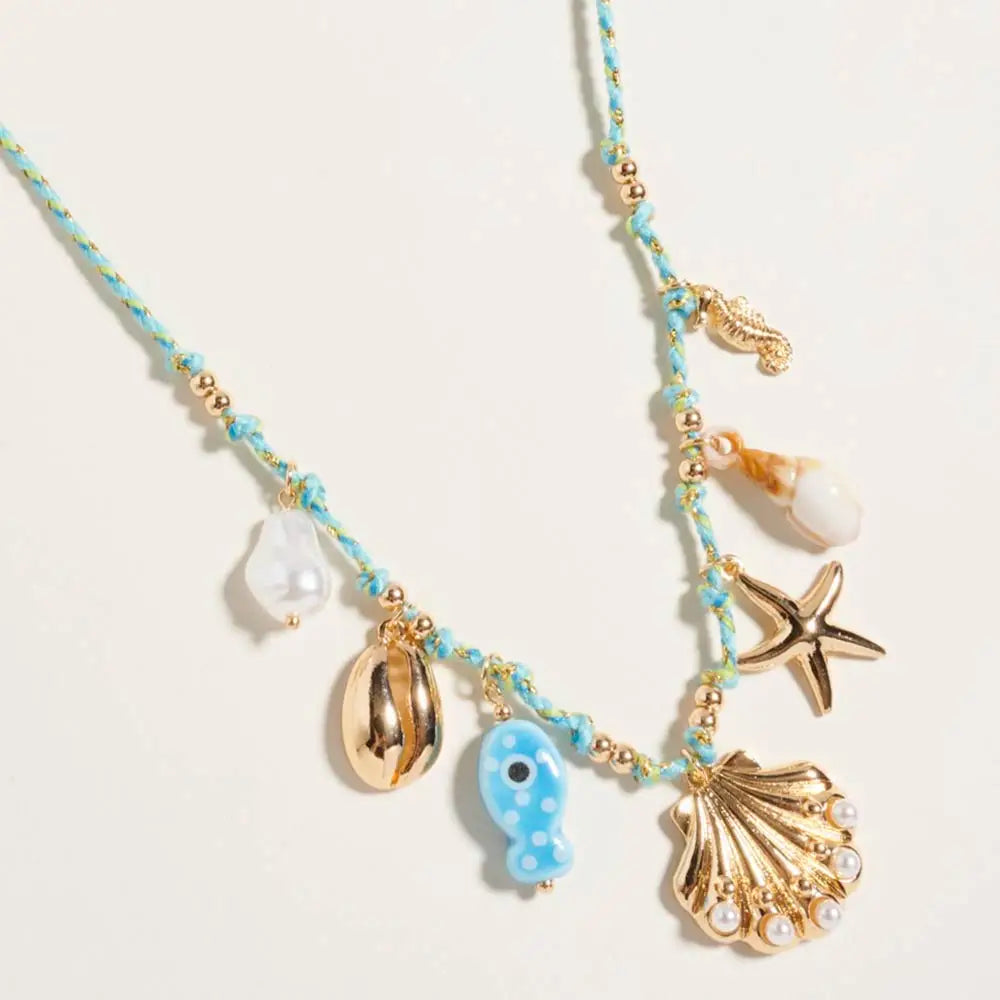 Madeline Love Gold, Turquoise Pearl Seashell Starfish Seahorse Charm Station Fabric Chain Twisted Necklace - Necklaces