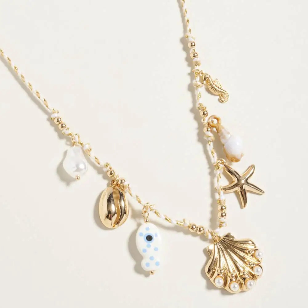 Madeline Love Gold, White Pearl Seashell Starfish Seahorse Charm Station Fabric Chain Twisted Necklace - Necklaces
