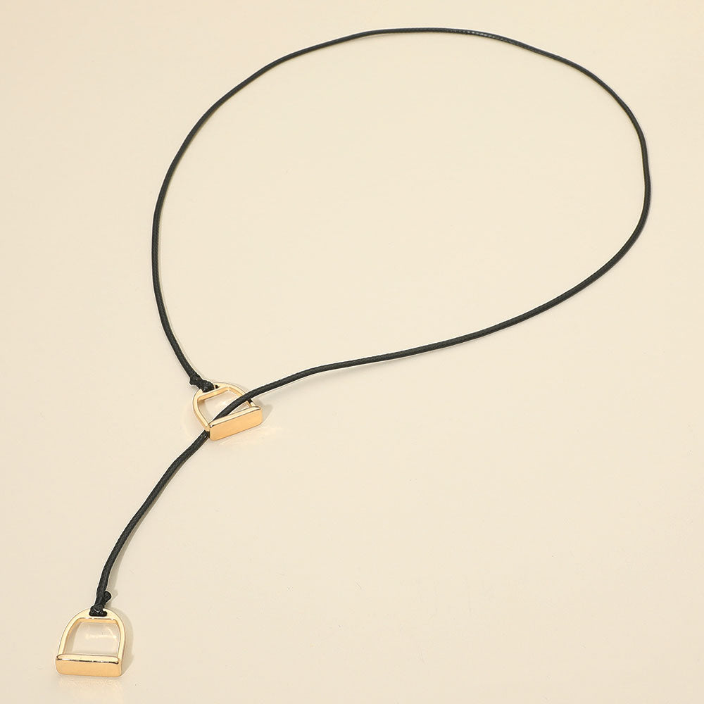 Madeline Love Black, Gold Metal Horsebit Lariat Waxed Cord Necklace - Necklaces