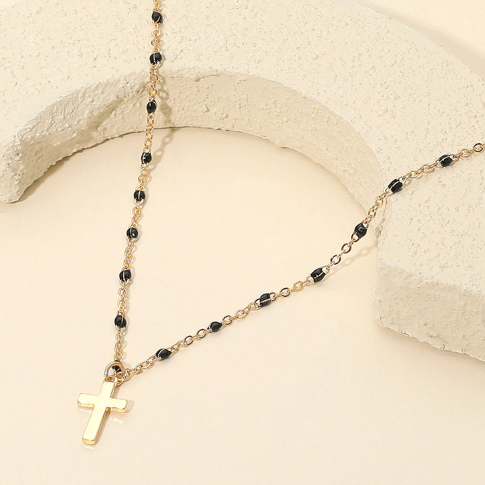 Madeline Love Jet Black Cross Pendant Beaded Chain Necklace