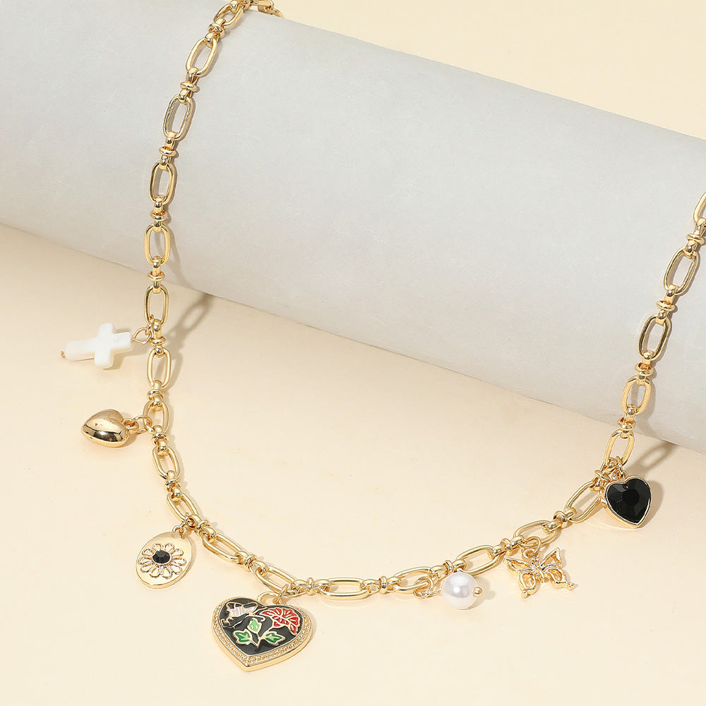 Madeline Love Black, Gold Butterfly Flower Enamel Detailed Heart Pendant Charm Station Necklace - Necklaces