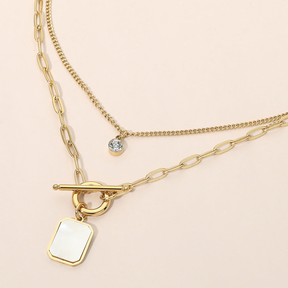 Madeline Love Cream, Gold Stainless Steel Mother of Pearl Rectangular Frame Toggle Pendant Round Stone Accent Layered Necklace
