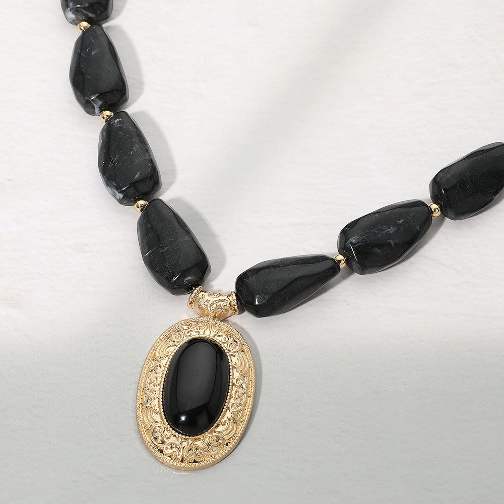 Madeline Love Black, Worn Gold Ornate Oval Pendant Chunky Beaded Statement Necklace