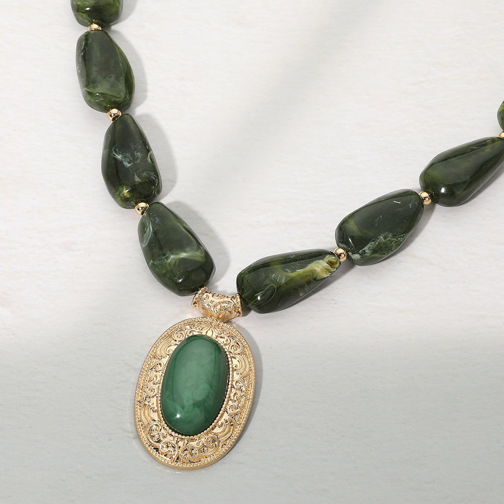 Madeline Love Green, Worn Gold Ornate Oval Pendant Chunky Beaded Statement Necklace