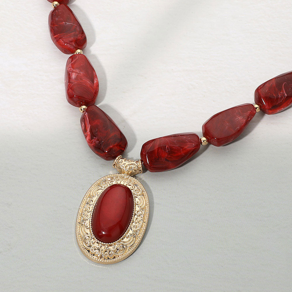 Madeline Love Red, Worn Gold Ornate Oval Pendant Chunky Beaded Statement Necklace