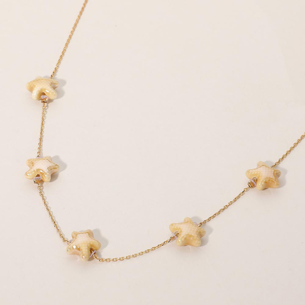 Cream, Gold Ceramic Starfish Station Necklace