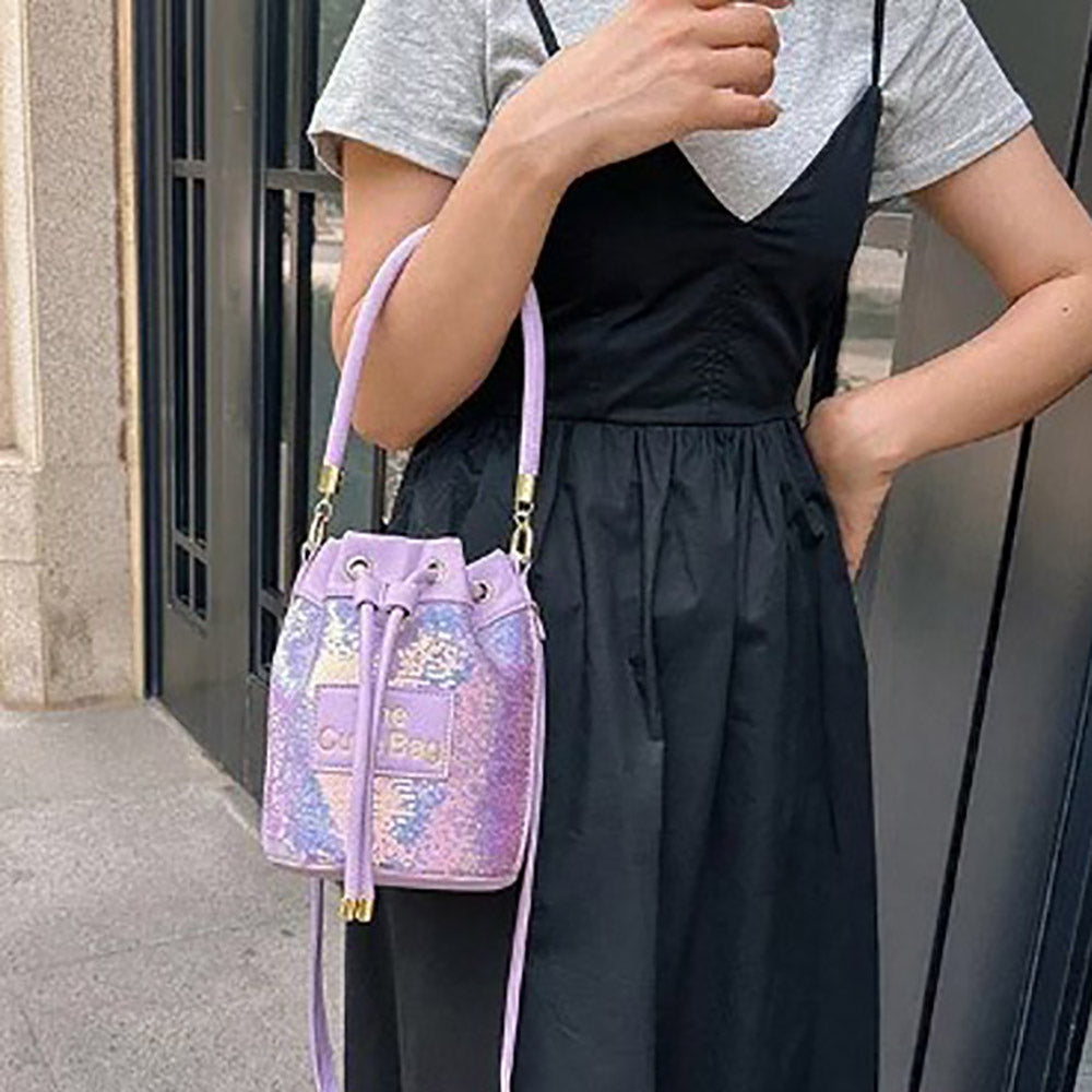 Madeline Love Lavender Faux Leather THE CUTE BAG Message Sequin Crossbody Bucket Bag - Bags & Wallets