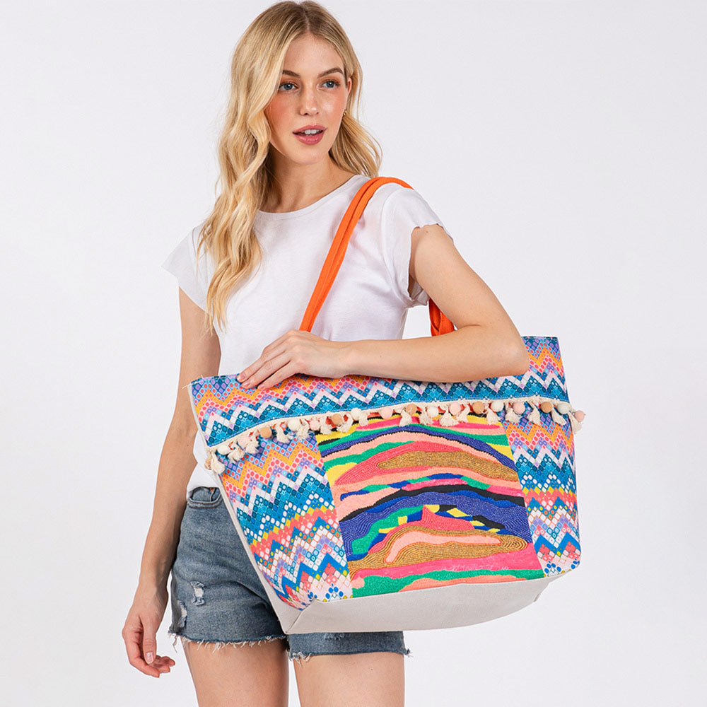 Madeline Love Multi, Orange Boho Print Pom Pom Fringe Tote Bag - Bags & Wallets