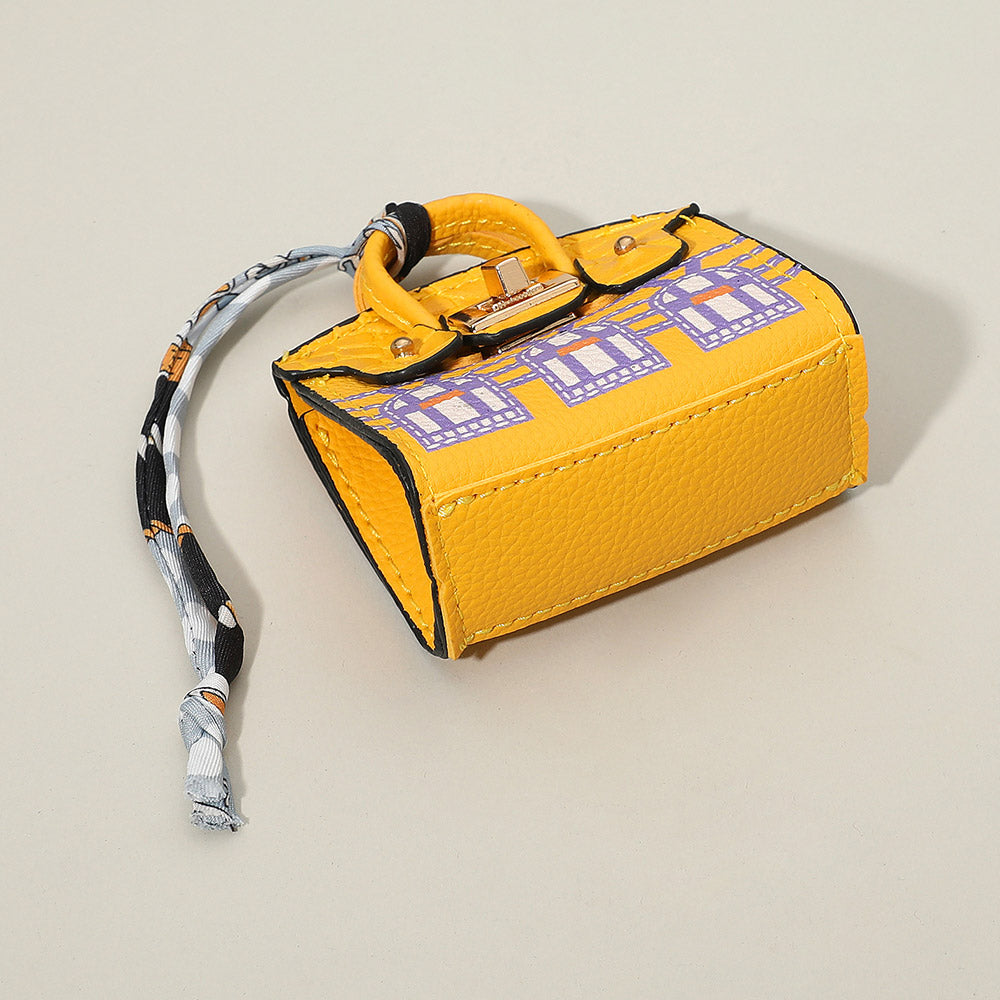 Madeline Love Yellow House Printed Faux Leather Elegant and Stylish Mini Purse Bag Charm - Bags & Wallets - desc