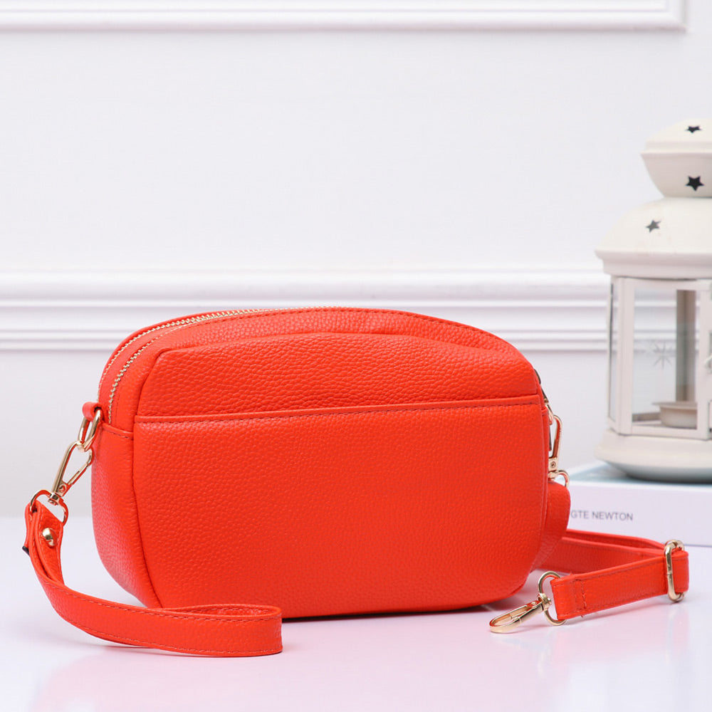 Madeline Love Orange Pebbled Faux Leather Crossbody Bag - Bags & Wallets