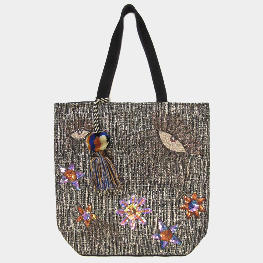 Madeline Love Black Evil Eye Accented Pom Pom Tassel Shoulder Bag - Bags & Wallets