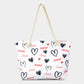 XOXO Love Beach Bag is the perfect accessory for a day at the beach. Crafted with durable materials, it can hold all your beach essentials with ease. Featuring a spacious design and a stylish XOXO pattern, this bag ensures you're ready for a fun day in the sun. Enjoy a carefree beach day with this must-have accessory. 